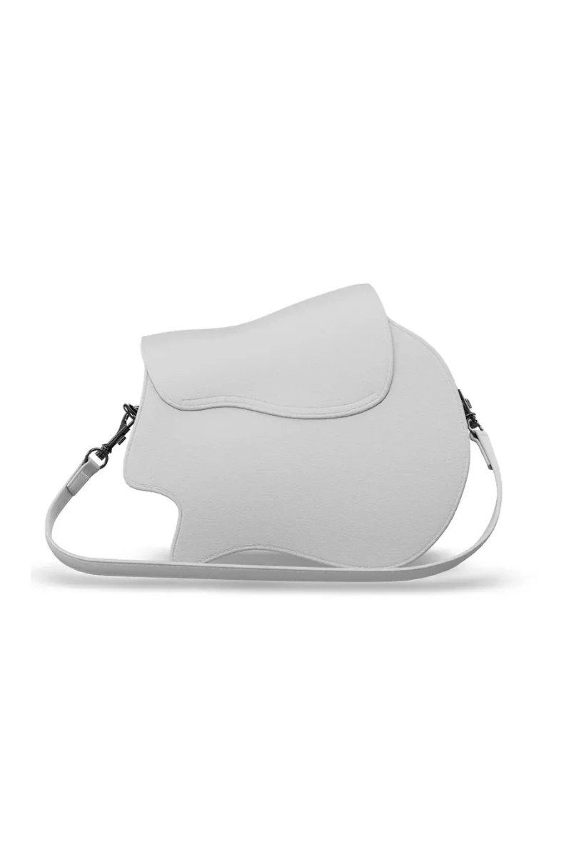 White handbag with a strap on a white background