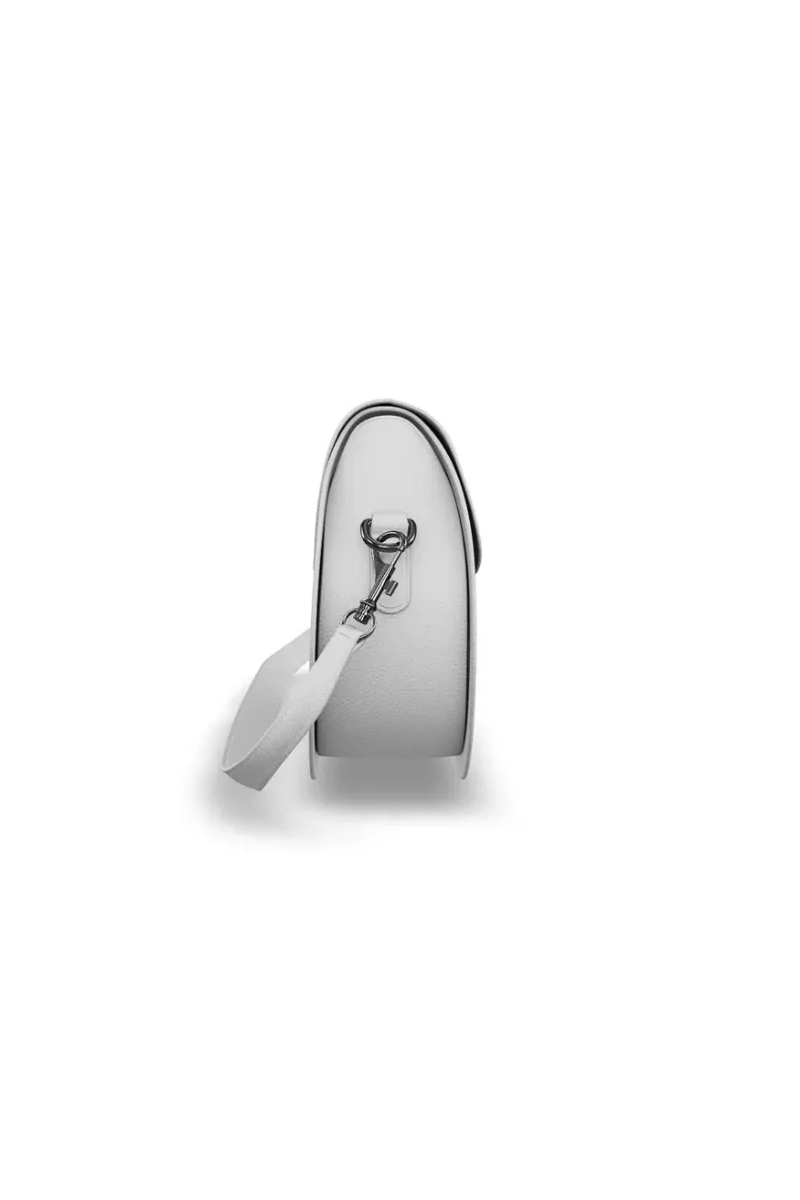 White shoe with a strap on a white background