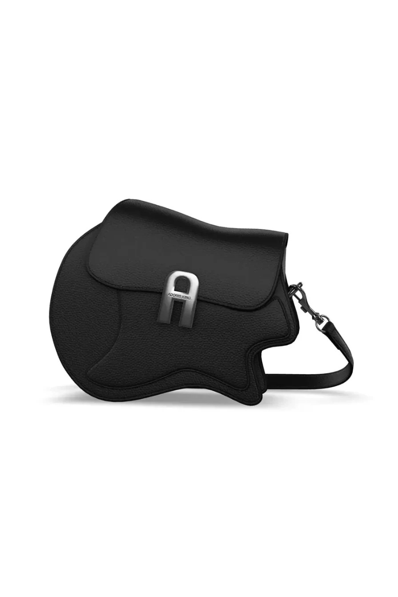 Black saddle-shaped bag with a silver buckle on a white background